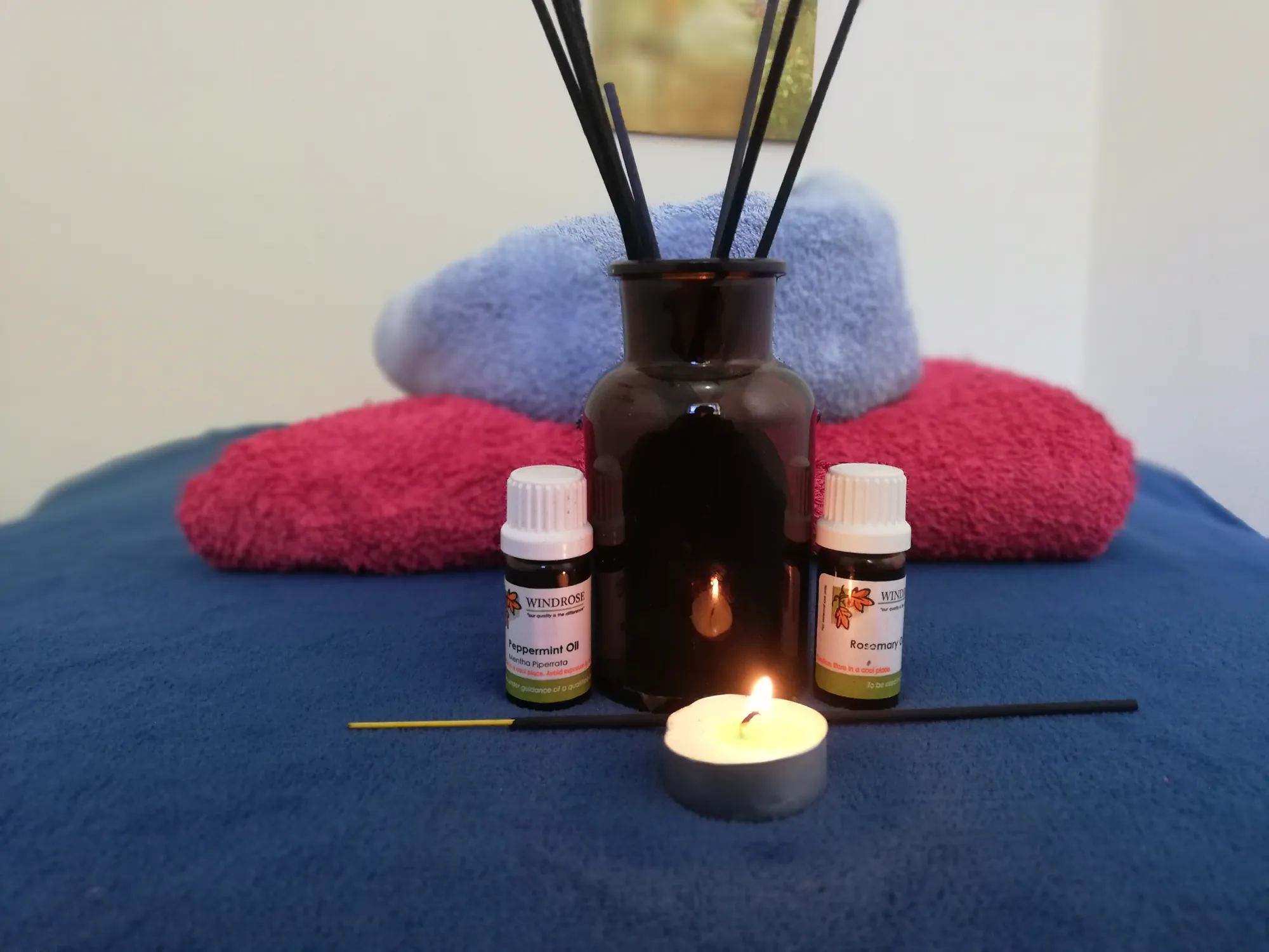 Professional spa setup – essential oils and towels